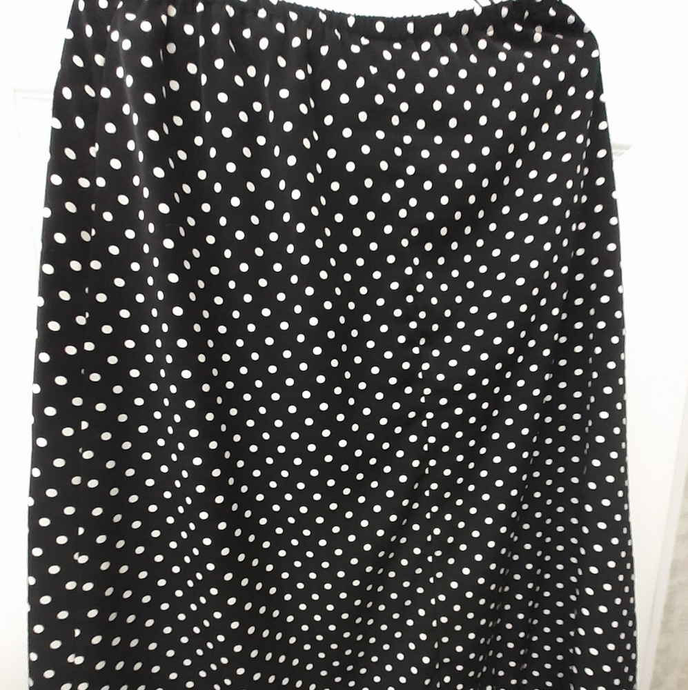 Black skirt with white polka-dot. Size 14